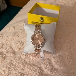 Invicta Gold Watch with Crystal Embellishments